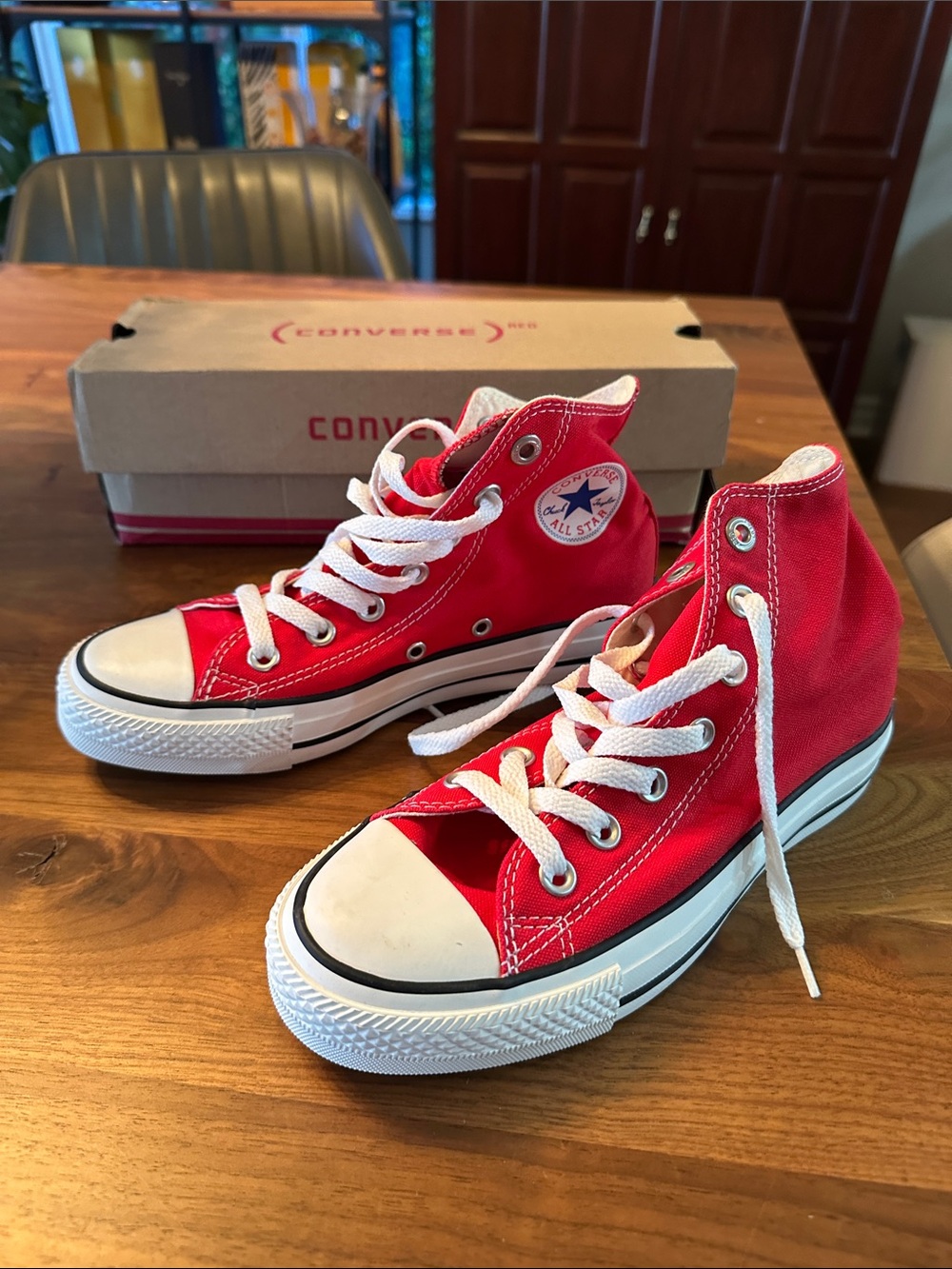 Converse Red chuck Taylor high tops
Red collab
